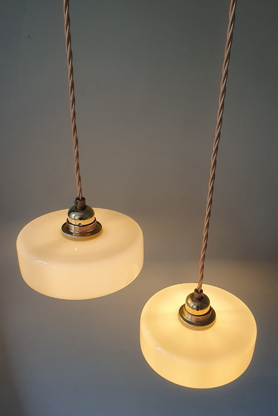 Image 1 of Vintage pendant lamp set (2) of yellow pastel opaline glass. Art Deco design.