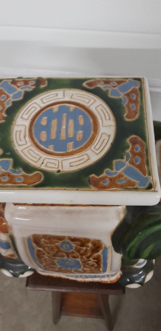 Image 1 of Tavolo in ceramica con pianta di elefante