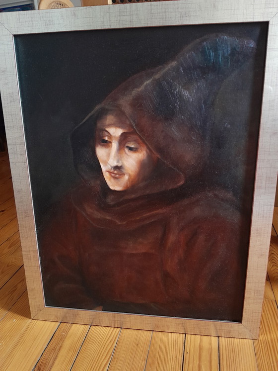 Image 1 of Retrato al óleo de un monje con un vestido rústico sobre un fondo marrón