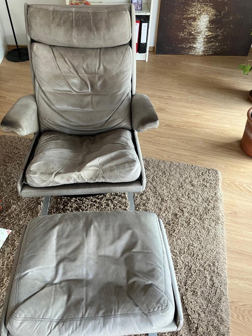 Sillón COR Swing de cuero con reposapiés – fauteuils, Leather