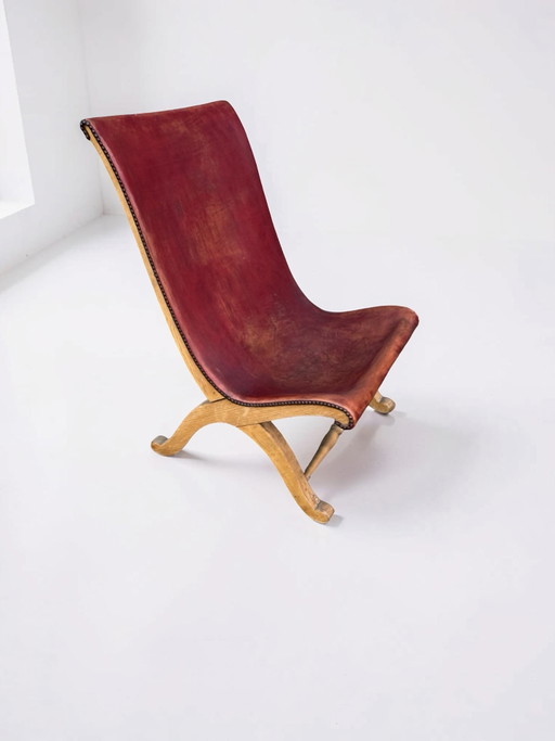 Fauteuil crapaud en cuir rouge de Pierre Lottier pour Valenti