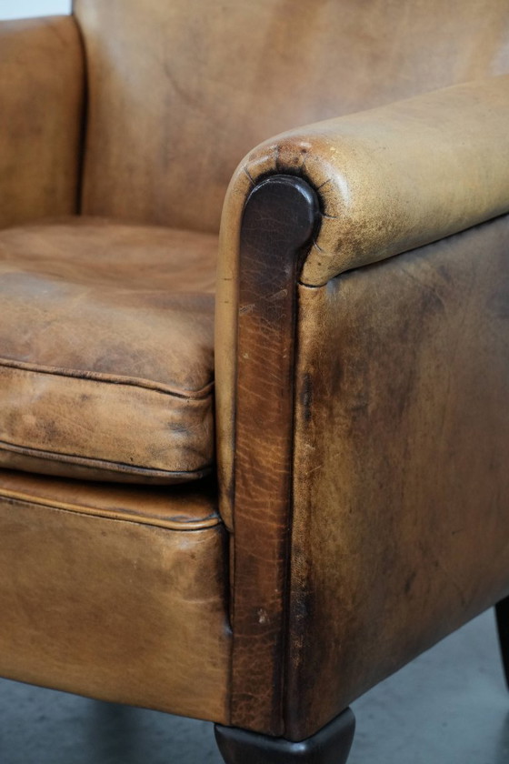 Image 1 of 2 x Subtiele vintage schapenleren fauteuil met een mooie lichte kleur