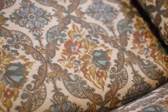 Image 1 of Set van 2 vintage draaibare fauteuils met hoge rugleuning en abstracte bekleding.