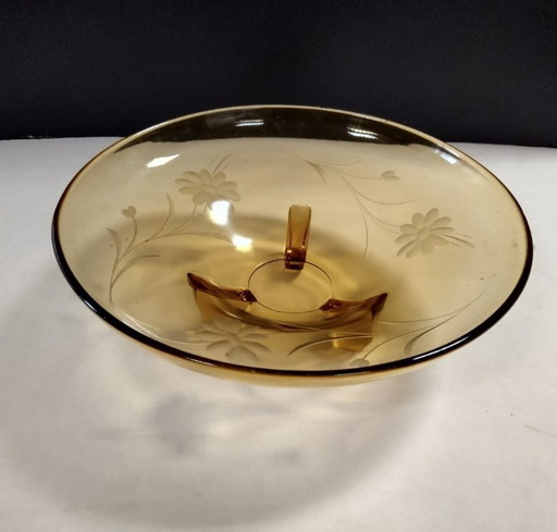 ciotola color ambra su gambe con motivo floreale