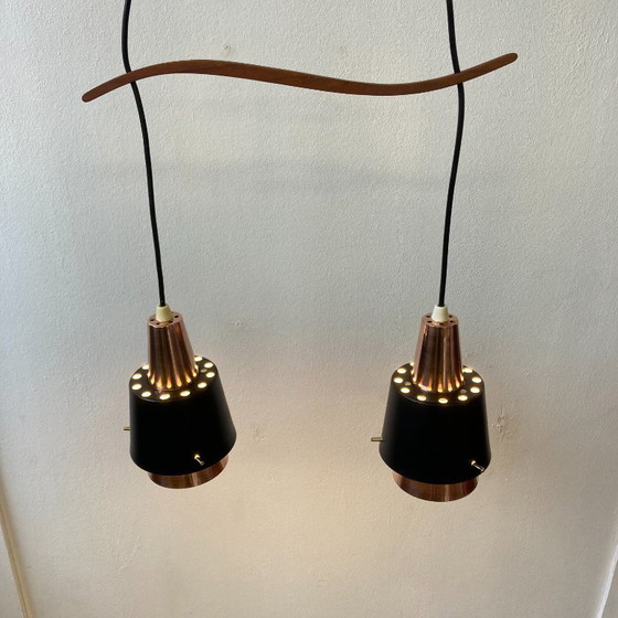 Image 1 of Danish vintage double pendant lamp with teak – in the style of Bent Karlby