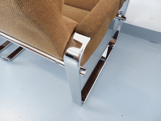Image 1 of Een paar vintage Eero Aarnio fauteuils voor Framac, uitgevoerd in stof en chroom, uit de jaren 60 en 70.