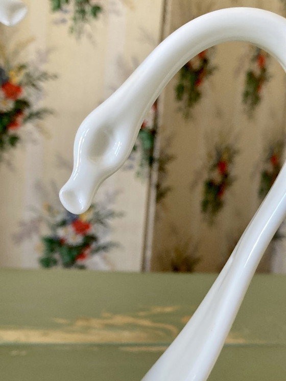 Image 1 of Pair of decorative swans handcrafted from opaque glass