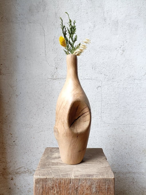 Vase/bottle in carved solid oak
