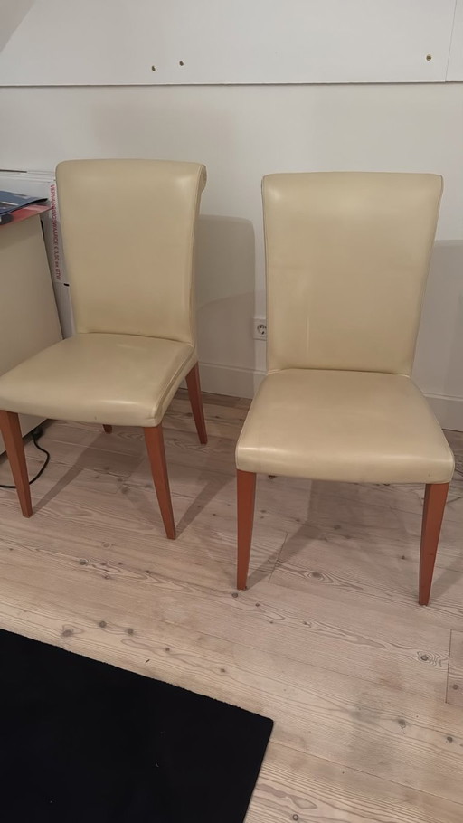 8 Poltrona Frau creme kleurige design stoelen 