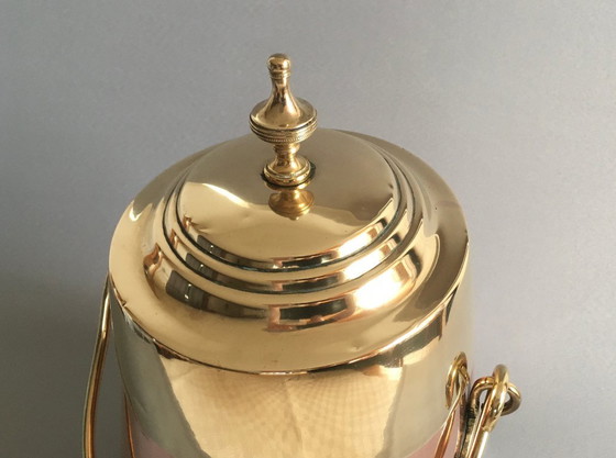 Image 1 of Red copper extinguishing pot with yellow copper lid and handle