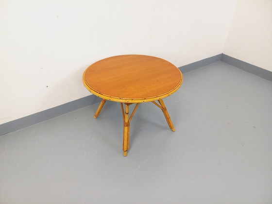 Image 1 of Vintage 1960s round coffee table in rattan and wood