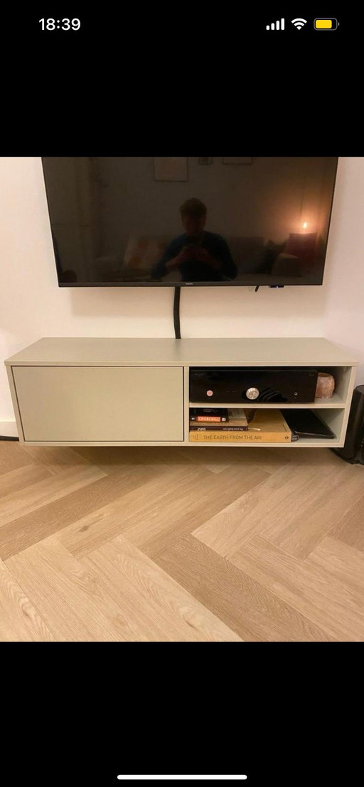 Sage green TV cabinet