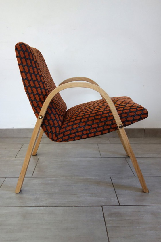 Image 1 of Een paar Bow Wood fauteuils van Steiner, jaren 1950.