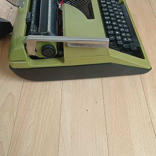 Original 70s travel typewriter from Olympia International, model Monica