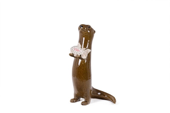 Image 1 of Valérie Courtet. Loutre Tenant un Poisson. Contemporain.