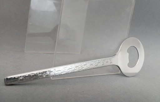 Abridor de botellas Krupp Berndorf 'Can can' de estilo modernista/op-art. Diseñado por Peter Hagenauer, década de 1970.