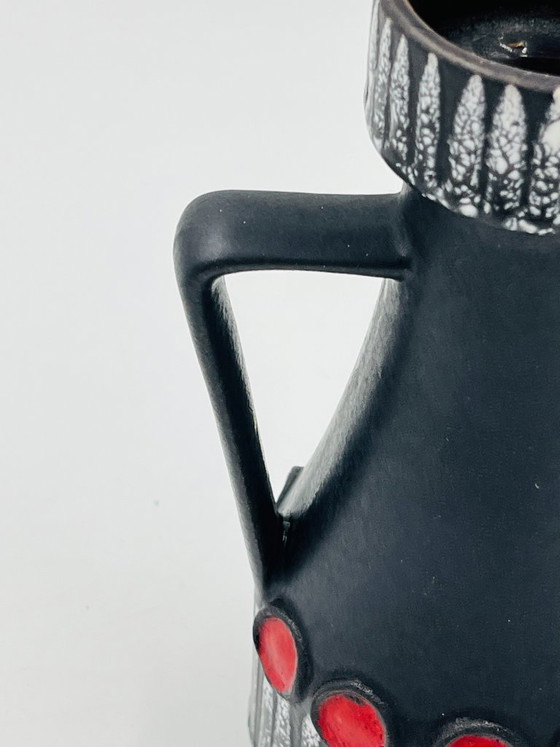 Image 1 of Schlossberg Isle Stephan black and red vintage vase