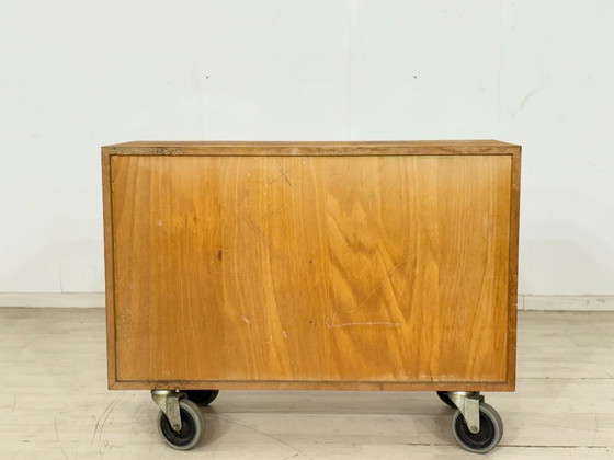 Image 1 of Beautiful vintage apothecary cabinet / compartment cabinet on casters – 16 compartments