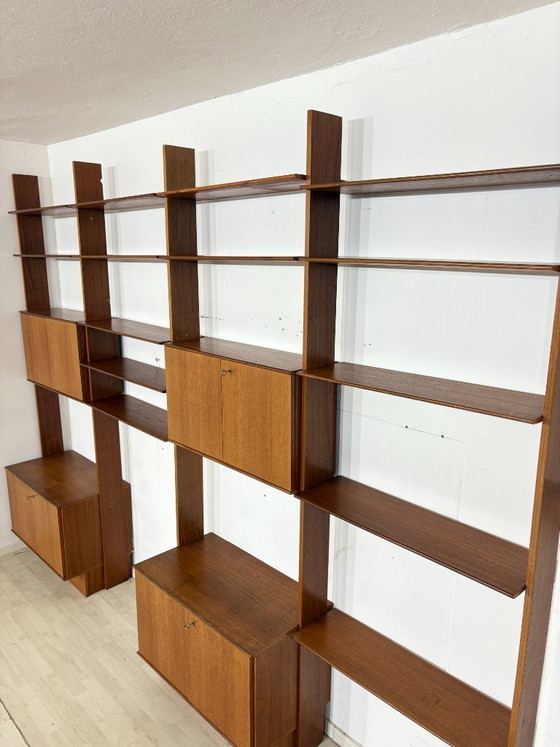 Modular mid-century wall shelf by interna-Peter Pedrides / Teak shelving system 1960s – Shelving unit, Wood (photo 24 of 27)