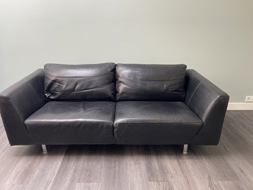Molinari designer sofa black leather with signs of use