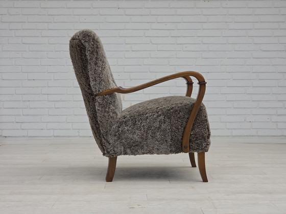 Image 1 of 1960s Reupholstered Danish Armchair in New Zealand Genuine Sheepskin