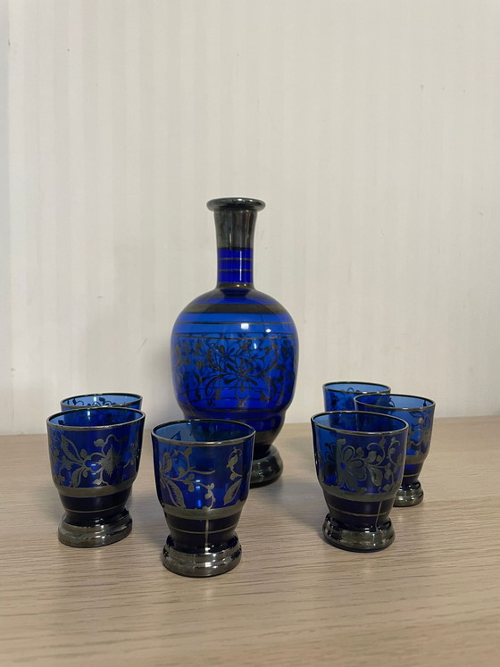 Image 1 of Rosolio-fles: 1 fles en 12 met zilver versierde glazen.