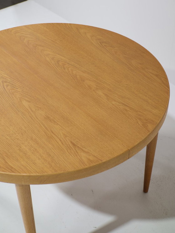 Image 1 of Extendable round dining table oak Danish