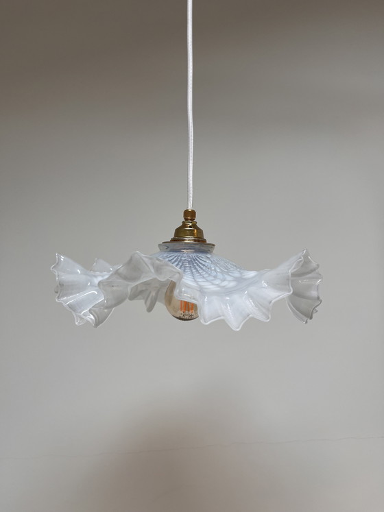 Image 1 of Atmospheric vintage pendant light featuring a distinctive glass shade, likely of French origin