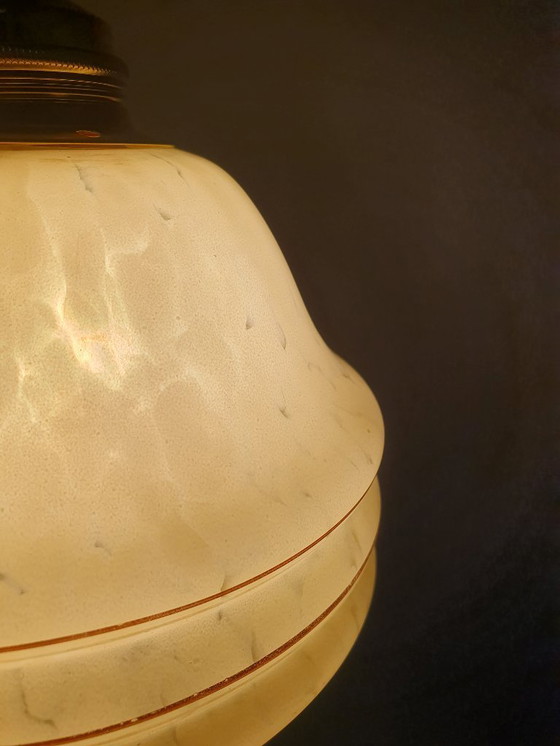 Image 1 of Vintage hanglamp - amberkleurig glas met spots en goudkleurige biezen.