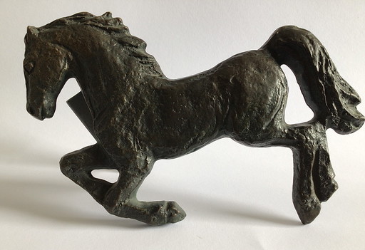 Bougeoir et poignée de porte en bronze