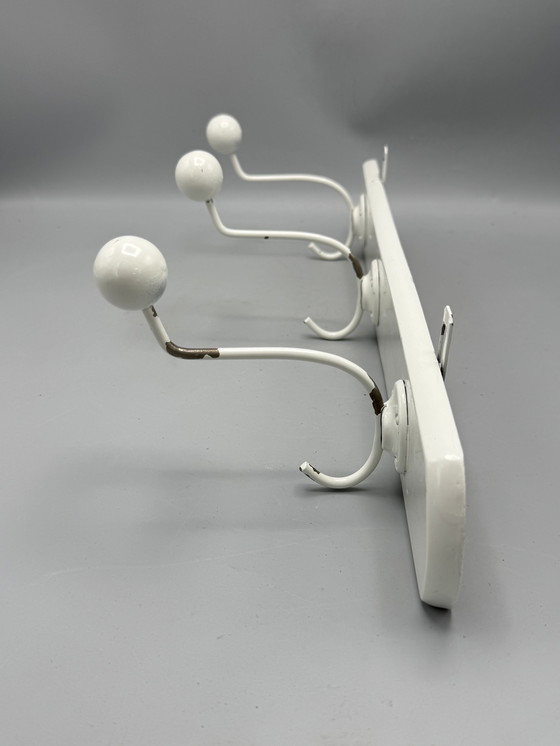 Image 1 of Mid - Century coat rack sleek and timeless design
