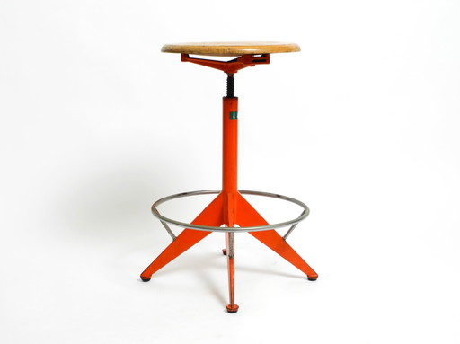 Rare solid Italian Mid Century Industrial metal stool by Mautren in rare orange | with height-adjustable seat