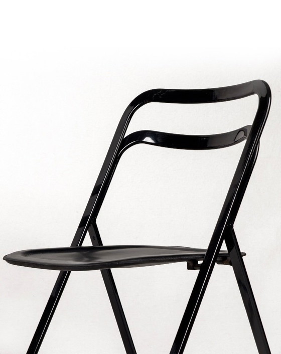 Image 1 of 4x Black metal and leather “Clio” folding chairs by Giorgio Cattelan