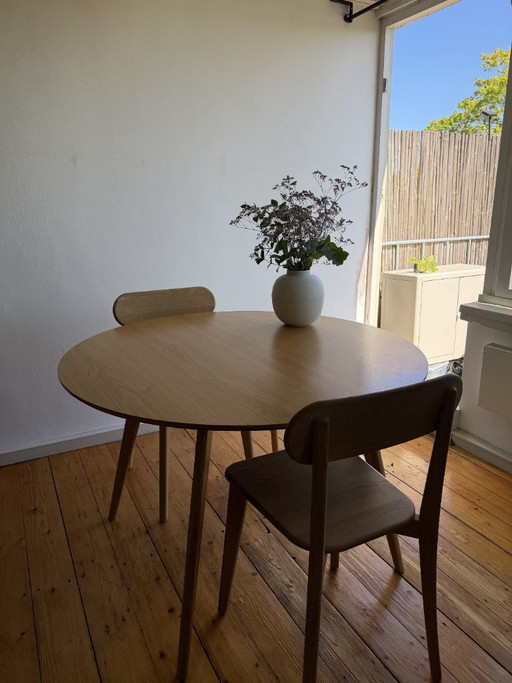 Round oak table with solid oak chairs