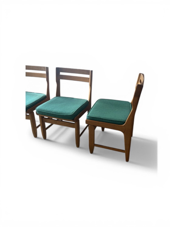Image 1 of Set van 6 eikenhouten stoelen "Raphaël" van Guillerme & Chambron voor uw huis.