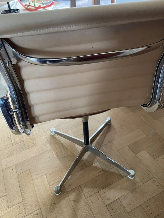 Image 1 of Chaise Eames originale des années 60-70 avec étiquette