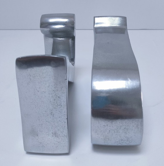 Image 1 of coppia di fermalibri in alluminio pressofuso a forma di "a" e "z"