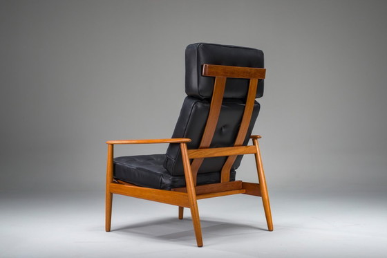 Image 1 of Fauteuil met model FD 164 frame van Arne Vodders en model 118 armleuningen van Grete Jalks in teak en zwart leer, Denemarken, ja