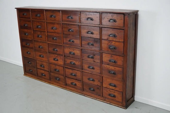 Image 1 of Grote antieke Franse grenen apothekerskast, begin 20e eeuw
