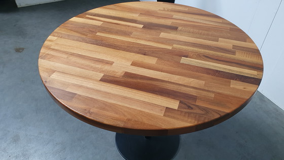 Image 1 of Round mixed wood table 100cm cast iron base Pedrali