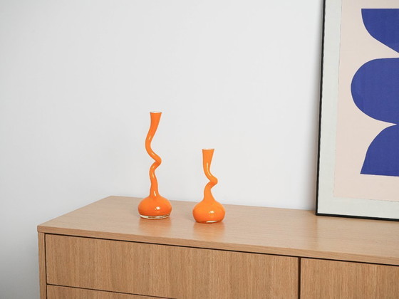 Image 1 of Orange vase, Swing Vase, Danish design, manufactured by Normann Copenhagen, designed by Britta Bonnesen