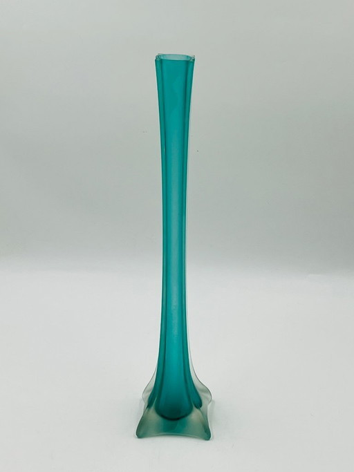 Murano-style turquoise glass bud vase in the shape of the Eiffel Tower