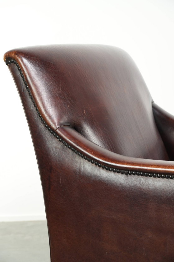 Image 1 of Poltrona di design in pelle di pecora in buone condizioni, con un bellissimo colore intenso e una seduta confortevole.