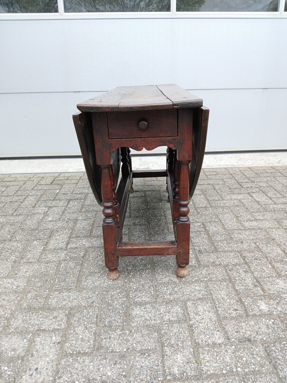 Image 1 of Antique English Gateleg Table from the 19th Century, Made of Solid Oak