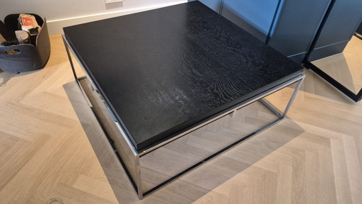 Mesa de centro de diseño JNL Collection Mikado – Acero inoxidable / madera negra – 100 × 100 cm