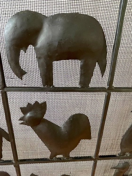 Image 1 of Parascintille in ferro battuto a forma di animale, stile Atelier Marolles, Francia, 1950