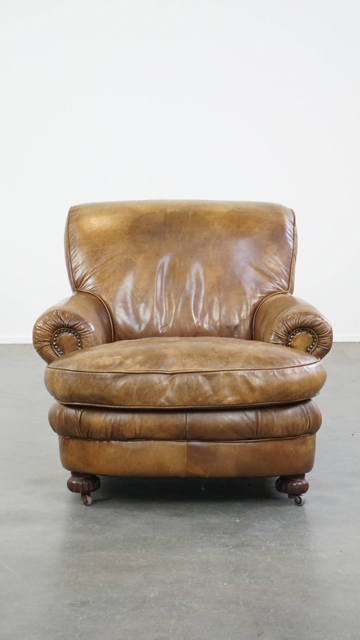 Fauteuil à roulettes en cuir de boeuf au design vintage