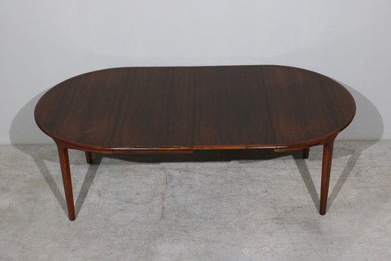 Image 1 of Table de salle à manger extensible en bois de rose par Henning Kjaernulf