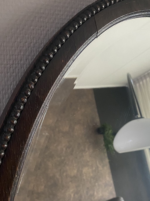 Large oval wooden antique mirror