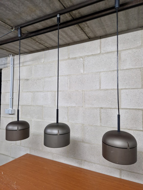 Image 1 of Staff Arnold Berges design hanglampen